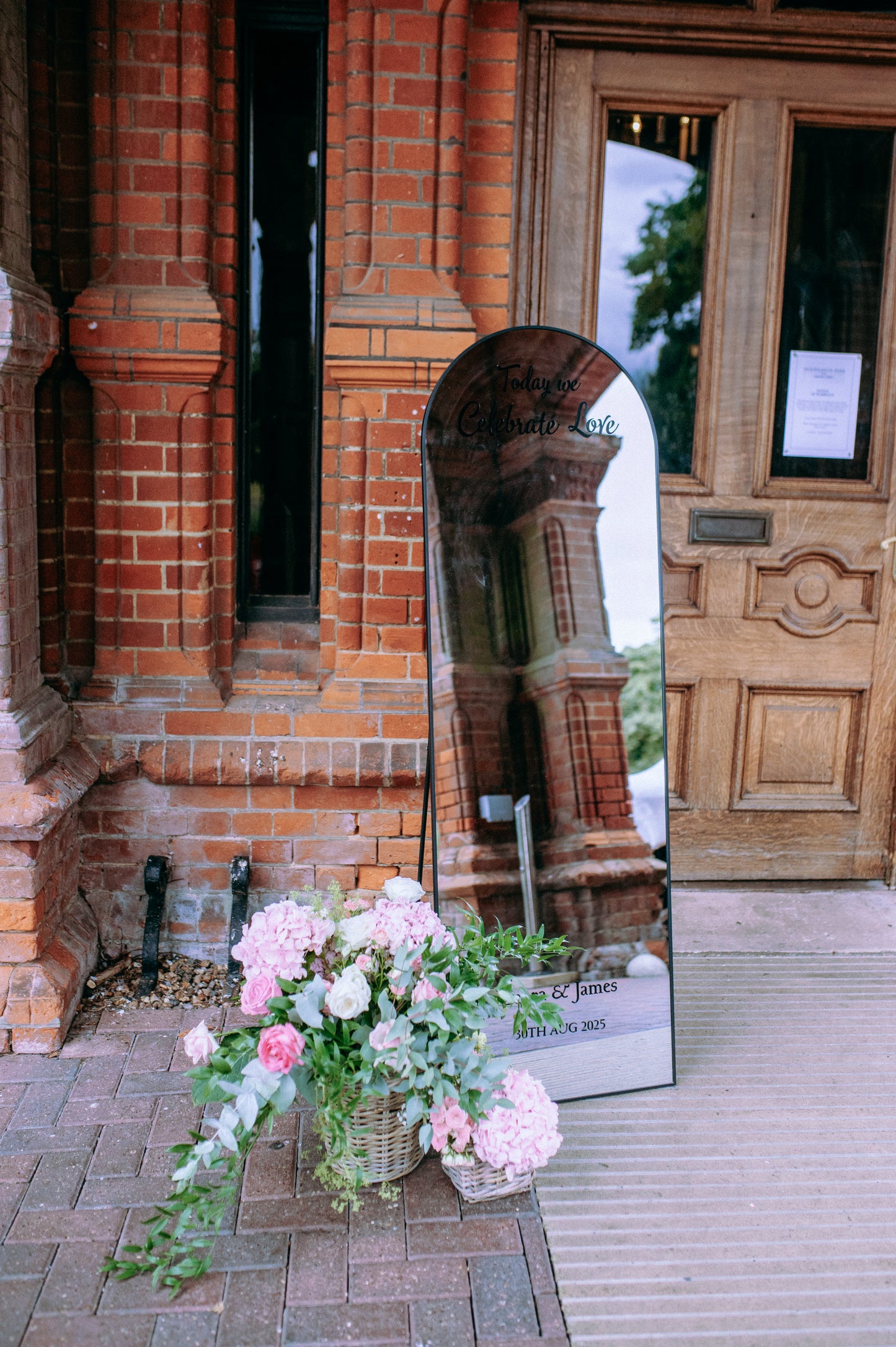 Decorative mirror with flowers welcoming guests