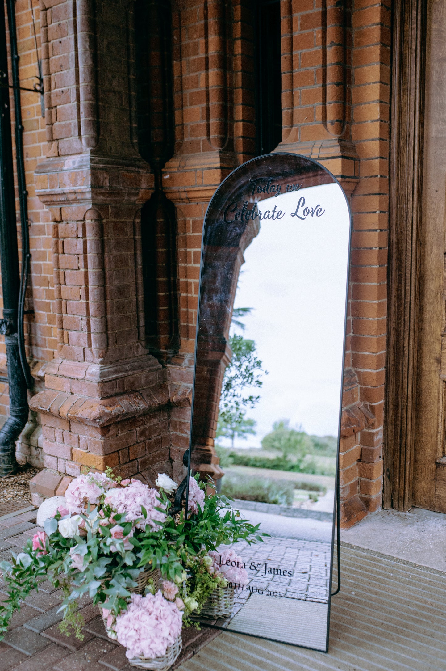 Decorative mirror with floral arrangement