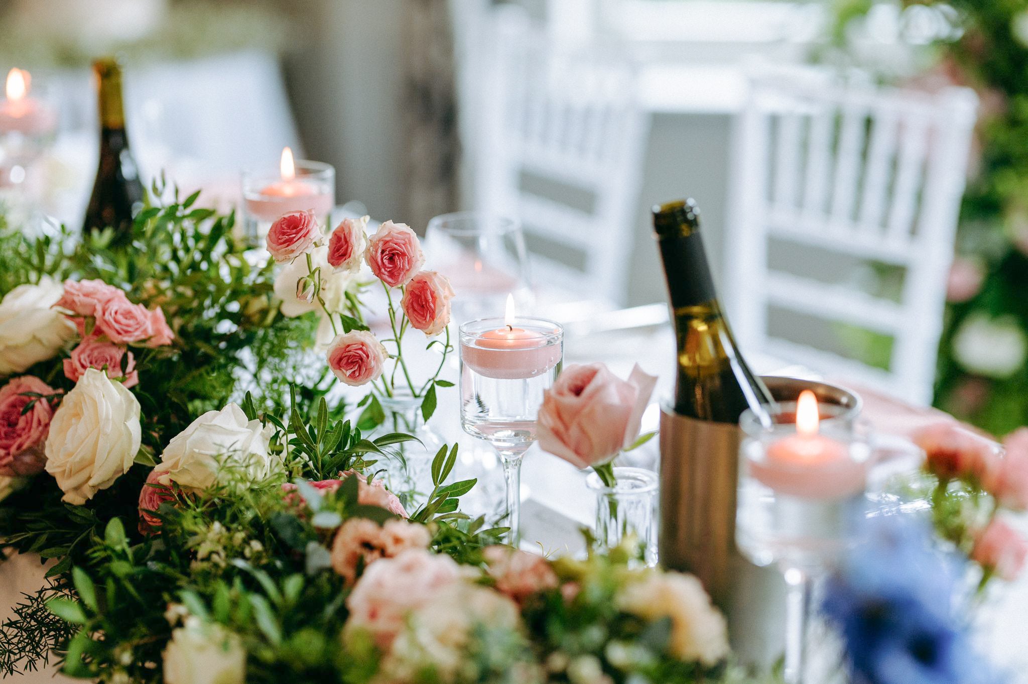 Headtable floral arrangements with candles